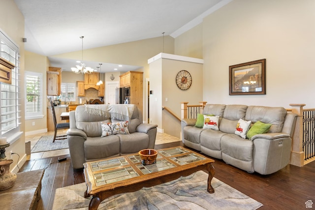 1455 W 600 S, Layton, UT 84041 - living area featuring a chandelier, dark wood-type flooring, and high vaulted ceiling