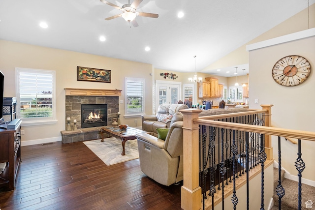 1455 W 600 S, Layton, UT 84041 - living room with lofted ceiling, ceiling fan, a stone fireplace, dark wood-type flooring, and recessed lighting