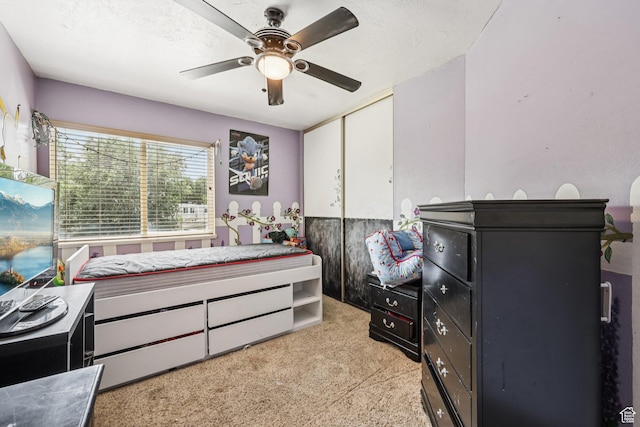 5249 S Gravenstein Park, Murray, UT 84123 - bedroom featuring light colored carpet, a ceiling fan, and a closet