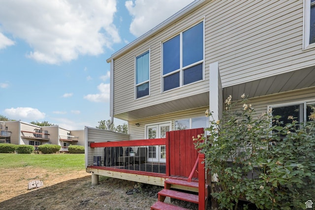 5249 S Gravenstein Park, Murray, UT 84123 - rear view of house with a deck and a lawn