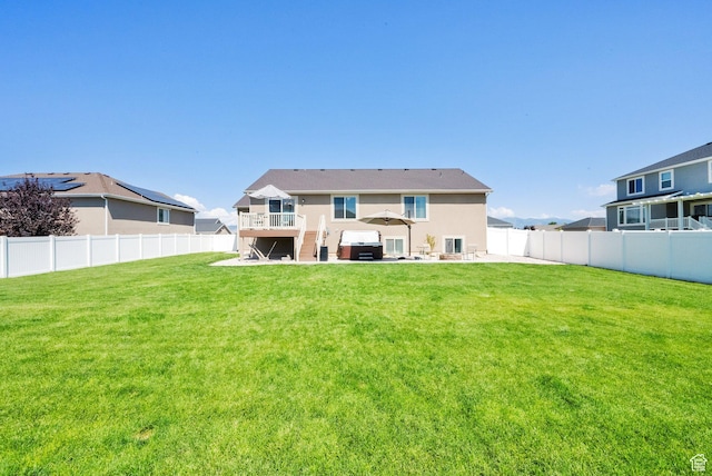 5295 S 4425 W, Hooper, UT 84315 - rear view of house featuring a fenced backyard, a patio area, and stucco siding