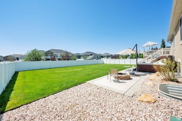 5295 S 4425 W, Hooper, UT 84315 - fenced backyard with a patio, a hot tub, a residential view, and a fire pit