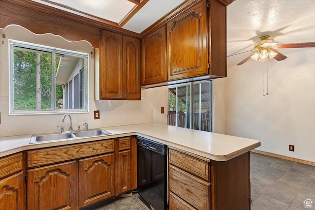 457 E 1750 N, North Ogden, UT 84414 - kitchen featuring dishwasher, a peninsula, ceiling fan, brown cabinets, and light countertops