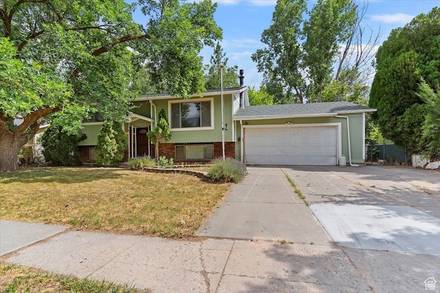 457 E 1750 N, North Ogden, UT 84414 - raised ranch with an attached garage, driveway, a front yard, and brick siding