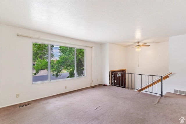 457 E 1750 N, North Ogden, UT 84414 - carpeted spare room with a ceiling fan and a textured ceiling