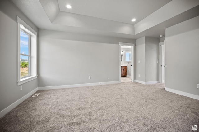 9420 N 5600, Elwood, UT 84337 - spare room with a tray ceiling, recessed lighting, and carpet flooring