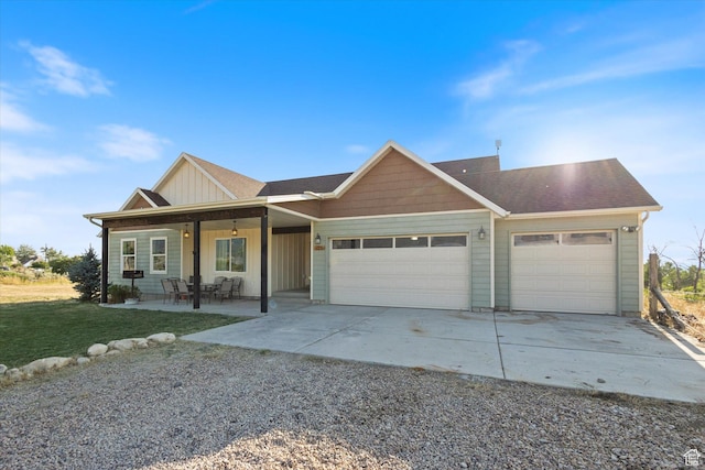 775 N 500 E, Spring City, UT 84662 - view of front of house with a garage, driveway, board and batten siding, and a front yard