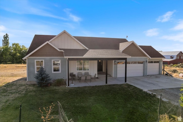 775 N 500 E, Spring City, UT 84662 - view of front of property featuring a garage, driveway, a front yard, board and batten siding, and a shingled roof