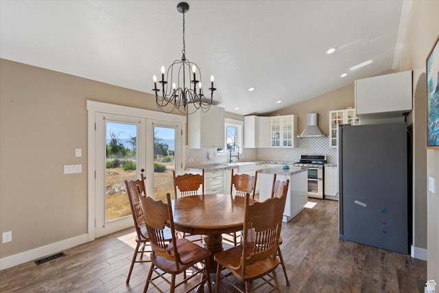 775 N 500 E, Spring City, UT 84662 - dining space featuring lofted ceiling, dark wood-type flooring, a chandelier, recessed lighting, and french doors