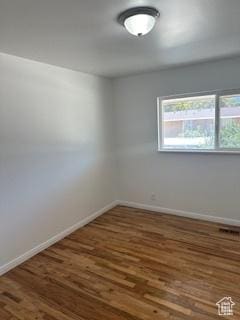 745 Three Fountains Cir E Unit 41, Salt Lake City, UT 84107 - spare room with wood finished floors and baseboards