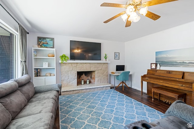1851 N Main St, Centerville, UT 84014 - living room with wood finished floors, a ceiling fan, and a stone fireplace