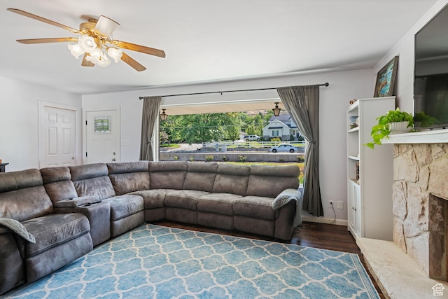 1851 N Main St, Centerville, UT 84014 - living room with wood finished floors, a ceiling fan, and a stone fireplace