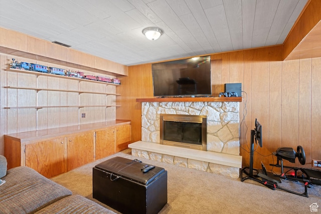 1851 N Main St, Centerville, UT 84014 - living room featuring carpet, wood walls, and a fireplace