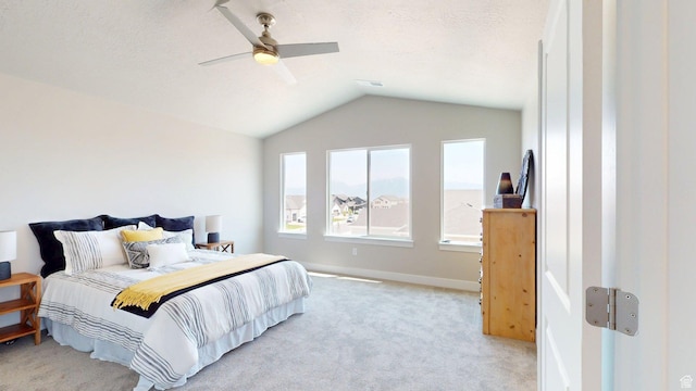 7497 W Sage Slope Way, Herriman, UT 84096 - bedroom with lofted ceiling, light colored carpet, and a ceiling fan