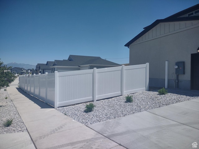 7497 W Sage Slope Way, Herriman, UT 84096 - view of home's exterior with a mountain view and stucco siding