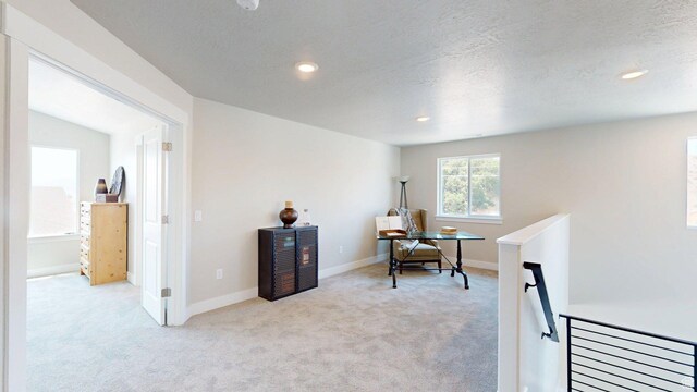 7497 W Sage Slope Way, Herriman, UT 84096 - office area with light carpet, recessed lighting, and a textured ceiling