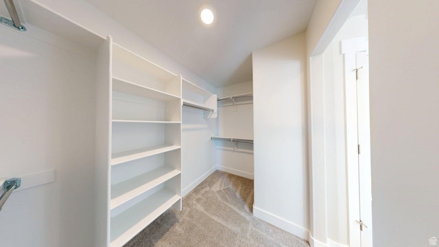 7497 W Sage Slope Way, Herriman, UT 84096 - walk in closet featuring carpet flooring