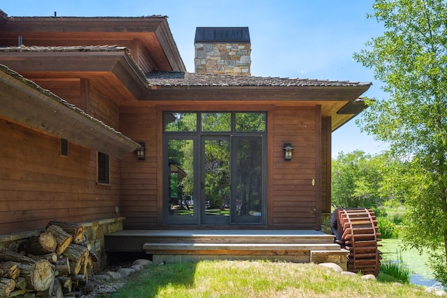 4445 N Millrace Rd, Oakley, UT 84055 - view of exterior entry with french doors and a chimney
