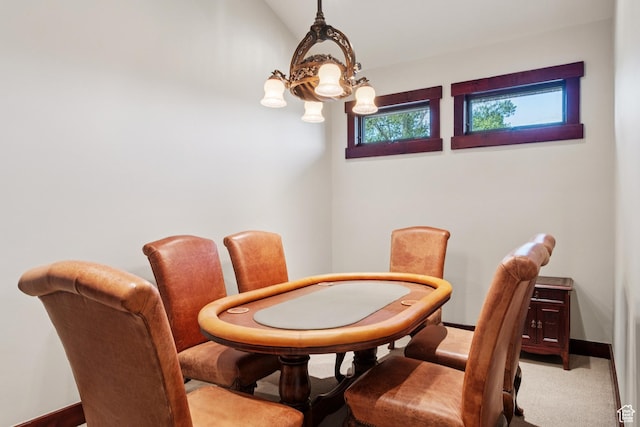 4445 N Millrace Rd, Oakley, UT 84055 - carpeted dining space featuring baseboards and lofted ceiling