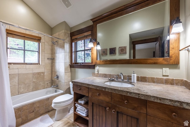 1825 Three Kings Dr Unit 703, Park City, UT 84060 - full bathroom featuring tiled shower / bath, vanity, healthy amount of natural light, vaulted ceiling, and tile patterned floors