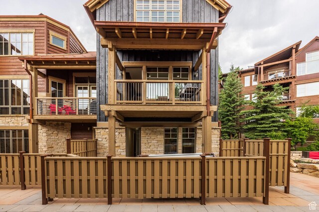 1825 Three Kings Dr Unit 703, Park City, UT 84060 - back of property featuring a balcony, stone siding, and board and batten siding