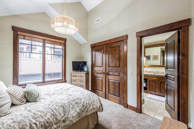 1825 Three Kings Dr Unit 703, Park City, UT 84060 - bedroom featuring a chandelier, light colored carpet, light tile patterned floors, and high vaulted ceiling
