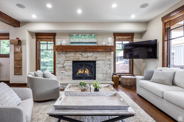 1825 Three Kings Dr Unit 703, Park City, UT 84060 - living area featuring wood finished floors, healthy amount of natural light, recessed lighting, and a fireplace