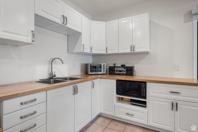 11508 S 5825 W, Payson, UT 84651 - kitchen with wood counters, black microwave, white cabinets, and light tile patterned floors