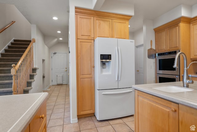 11508 S 5825 W, Payson, UT 84651 - kitchen with white fridge with ice dispenser, double oven, light tile patterned floors, recessed lighting, and light countertops