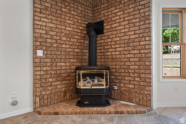 11508 S 5825 W, Payson, UT 84651 - detailed view of a wood stove and baseboards