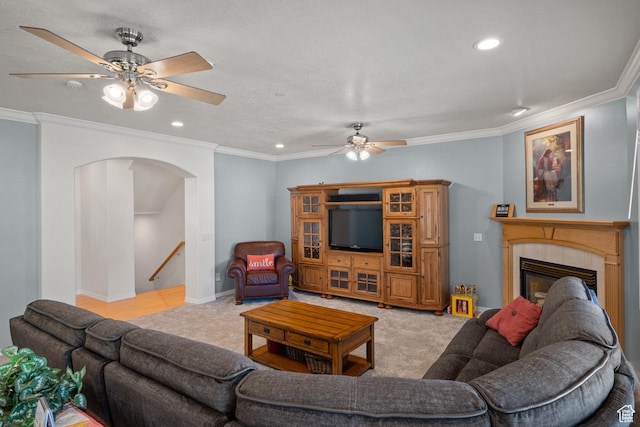 11508 S 5825 W, Payson, UT 84651 - living room with a ceiling fan, arched walkways, ornamental molding, recessed lighting, and light colored carpet