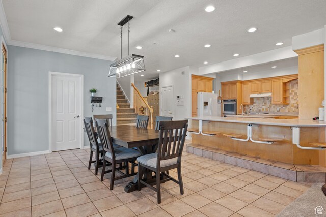 11508 S 5825 W, Payson, UT 84651 - dining room featuring light tile patterned flooring, recessed lighting, stairway, and ornamental molding