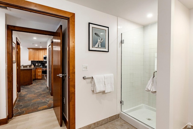 3720 N Sundial Ct Unit B322, Park City, UT 84098 - bathroom with a stall shower, recessed lighting, and vanity