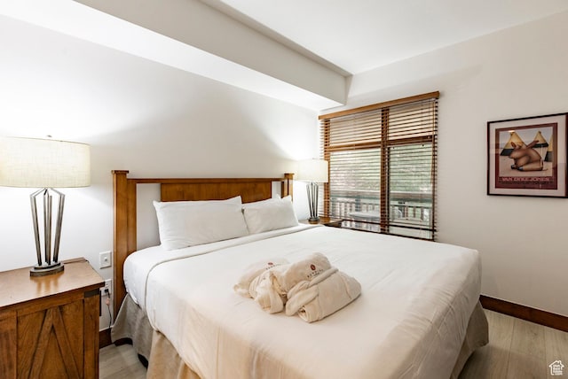 3720 N Sundial Ct Unit B322, Park City, UT 84098 - bedroom featuring wood finished floors and baseboards