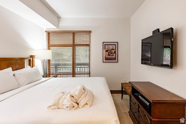 3720 N Sundial Ct Unit B322, Park City, UT 84098 - bedroom with light wood-type flooring and baseboards