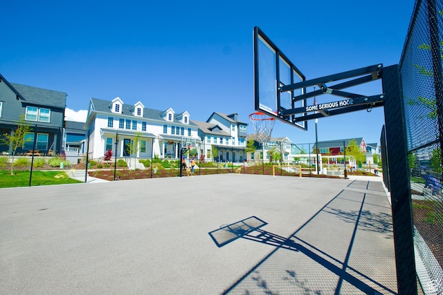 6669 W Skip Rock Rd, South Jordan, UT 84009 - view of sport court featuring a residential view, plenty of natural light, and community basketball court