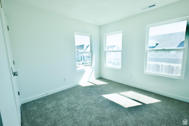 6669 W Skip Rock Rd, South Jordan, UT 84009 - carpeted spare room featuring baseboards