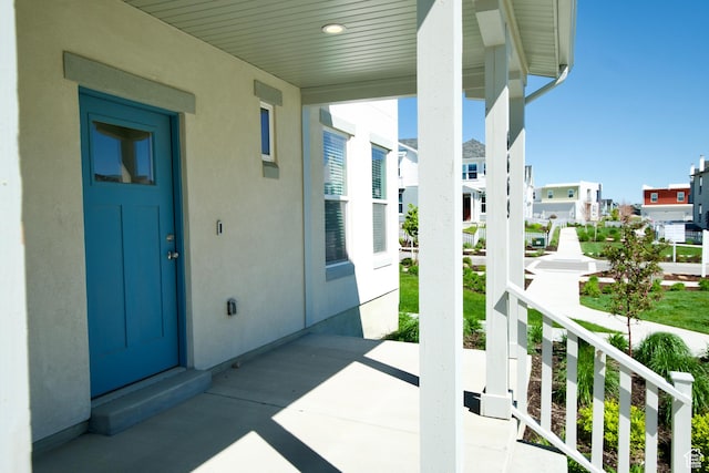 6669 W Skip Rock Rd, South Jordan, UT 84009 - porch featuring a residential view