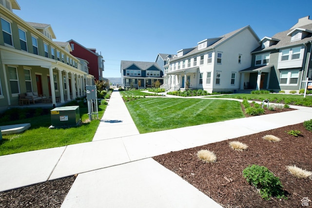 6669 W Skip Rock Rd, South Jordan, UT 84009 - view of home's community featuring a residential view and a yard