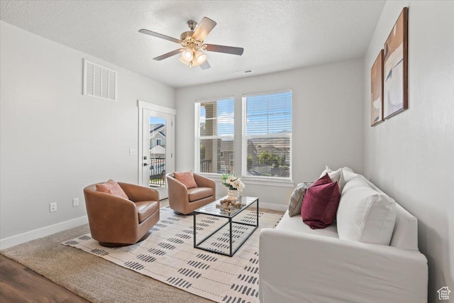 1806 W Newcastle Ln Unit 203, Saratoga Springs, UT 84045 - living room featuring a ceiling fan, a textured ceiling, and wood finished floors