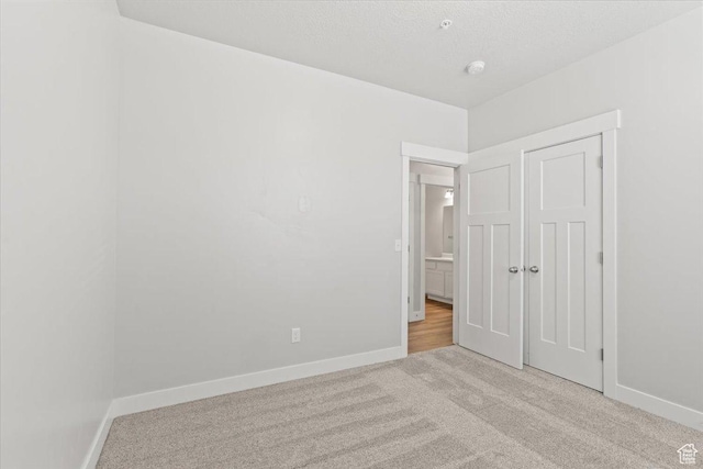 1806 W Newcastle Ln Unit 203, Saratoga Springs, UT 84045 - unfurnished bedroom with carpet flooring and baseboards