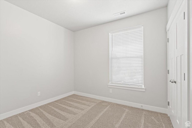1806 W Newcastle Ln Unit 203, Saratoga Springs, UT 84045 - empty room with light colored carpet