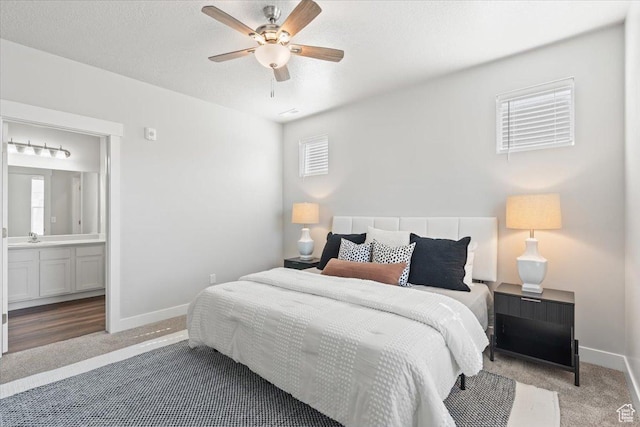 1806 W Newcastle Ln Unit 203, Saratoga Springs, UT 84045 - carpeted bedroom featuring connected bathroom and ceiling fan