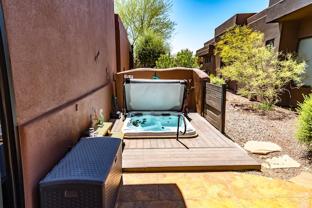 2336 W Entrada Trl Unit 26, St George, UT 84770 - wooden terrace featuring a covered hot tub