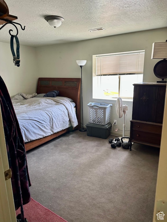 280 W Center St, Sterling, UT 84665 - bedroom featuring a textured ceiling and carpet