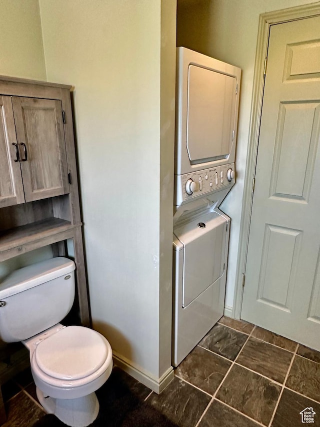 280 W Center St, Sterling, UT 84665 - bathroom featuring toilet and stacked washer / drying machine