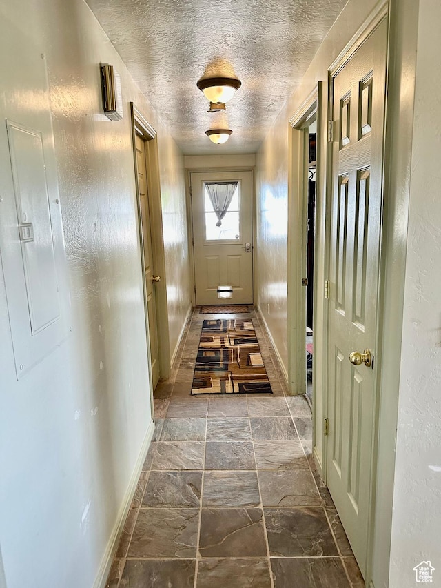 280 W Center St, Sterling, UT 84665 - entryway featuring a textured ceiling and electric panel