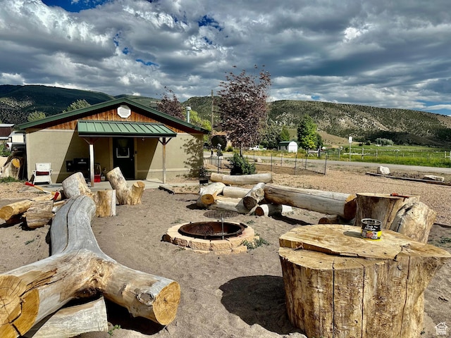 280 W Center St, Sterling, UT 84665 - exterior space with a mountain view and a fire pit