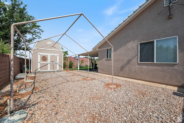 555 N Summit Rdg, Ivins, UT 84738 - view of side of property featuring a storage shed and stucco siding