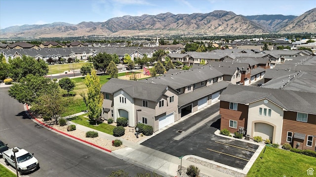 487 W 1490 N Unit 106, Logan, UT 84341 - aerial view of residential area with a mountain backdrop